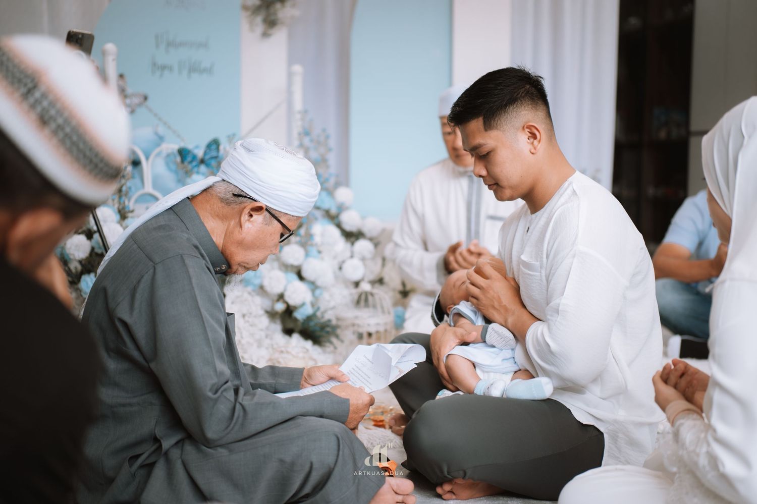 "Tahnik session" during akikah
