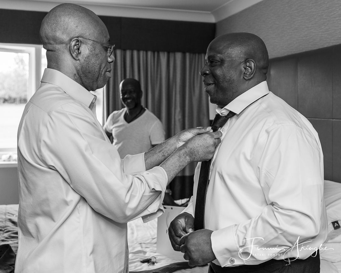 Wedding day groom and best man prep, captured by Pataki Photos