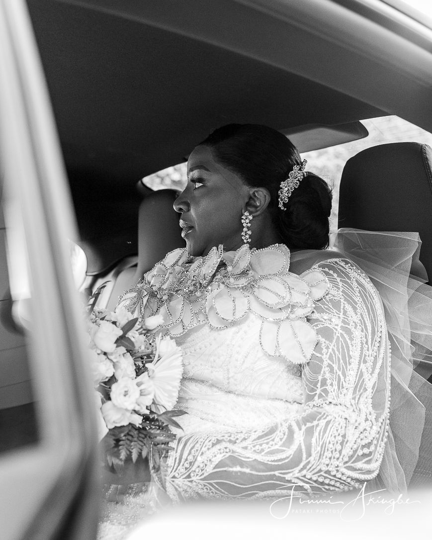 Reflective bride on the way to her wedding ceremony, captured by Pataki Photos