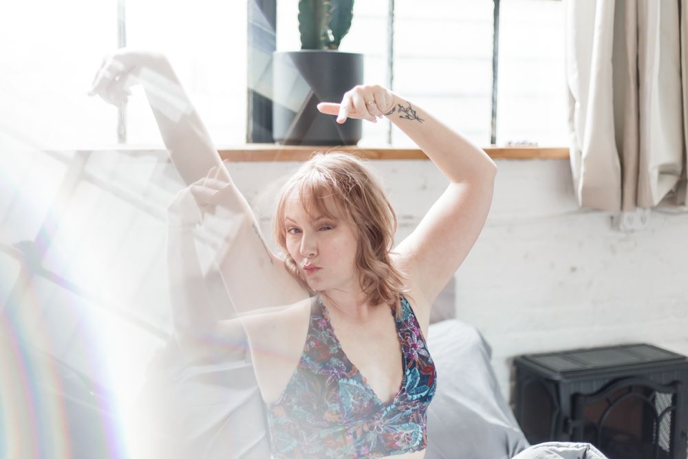 Series of dreamy, ethereal lifestyle portraits in muted tones against white furnishings.