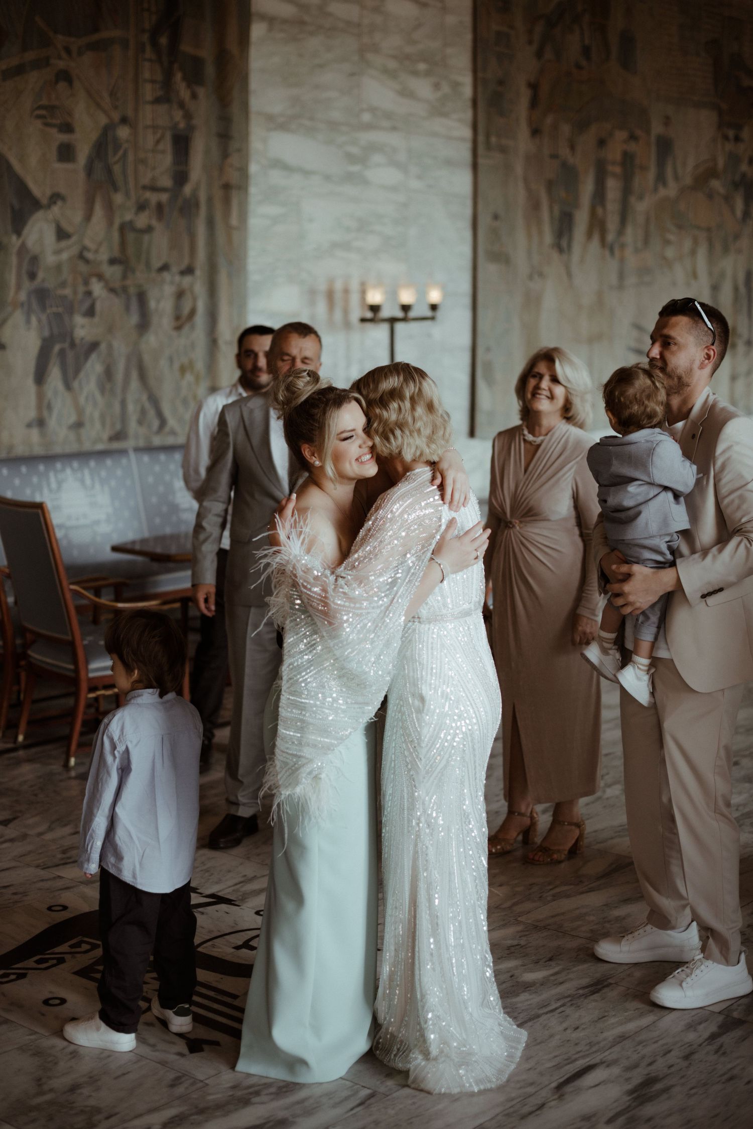A series of candid wedding photos showing tender moments between couples during an intimate ceremony in a rustic setting.