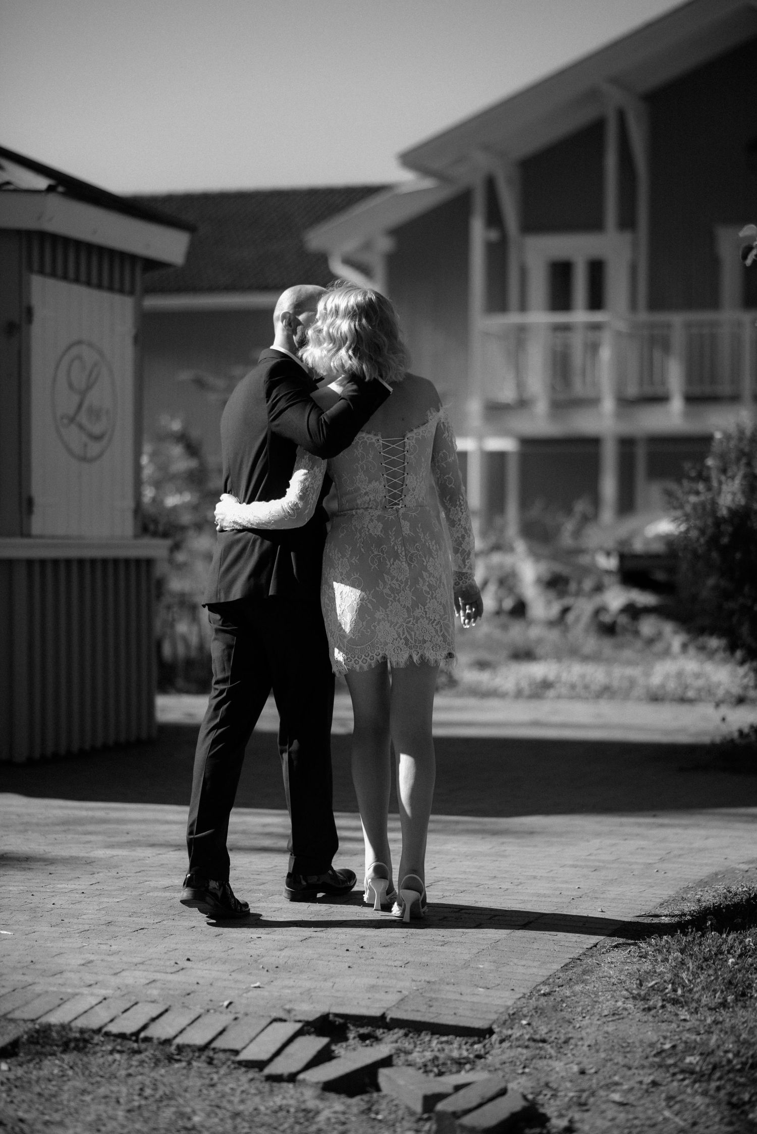 Black and white artistic series of embracing silhouettes shown in multiple intimate moments.