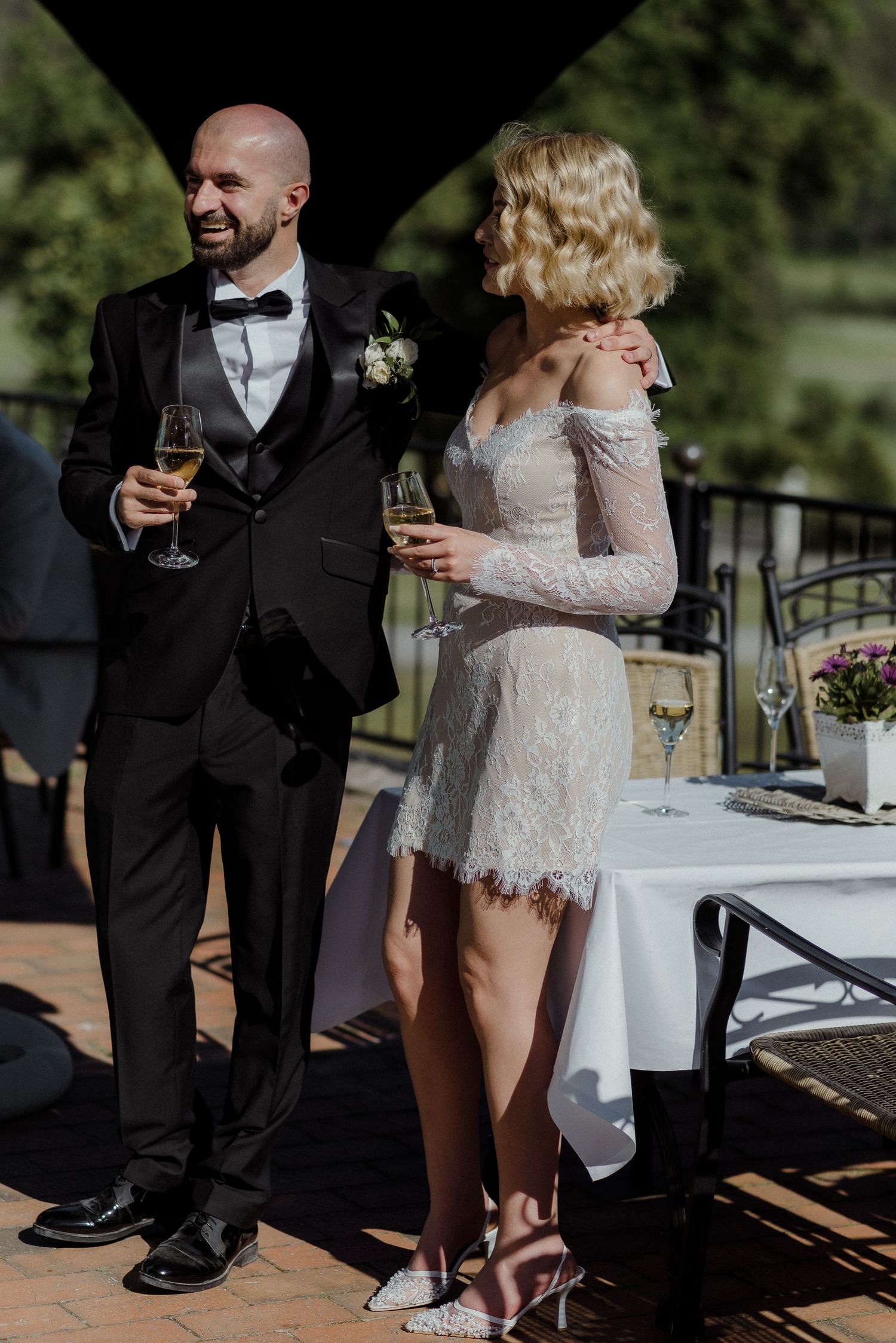 Candid wedding photos showing closeups of formal attire and champagne toasts outdoors.