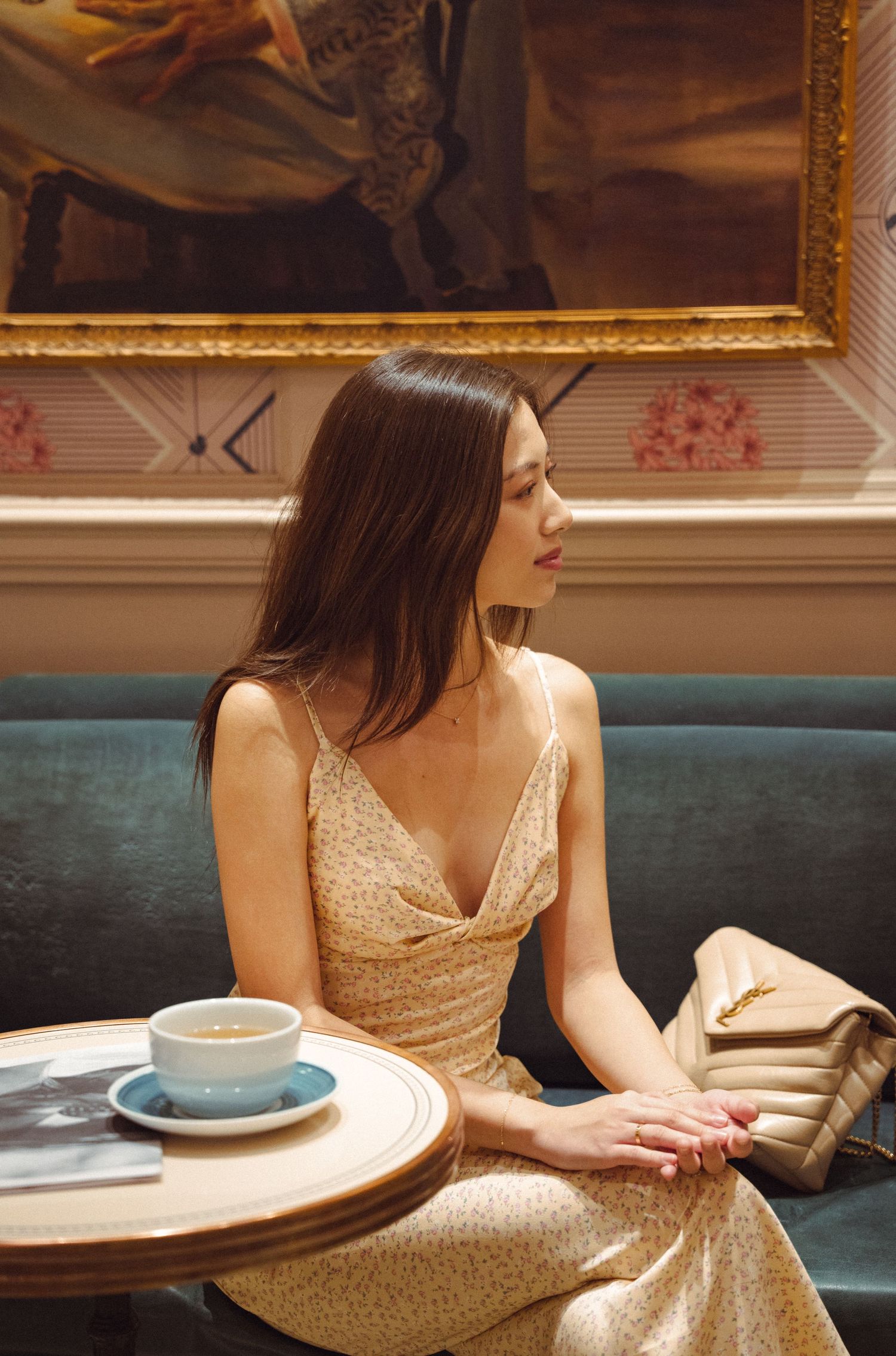 Beautiful woman portrait in a café, showcasing cinematic and aesthetic photography, capturing intimate moments and emotions