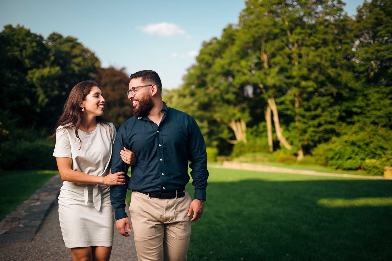 The madly in love couple take a romantic stroll through the Arnold Arboretum for their Boston Engagement session