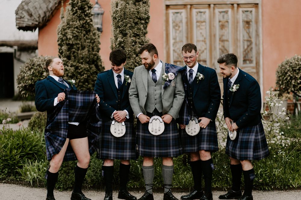 grooms men in a kilt