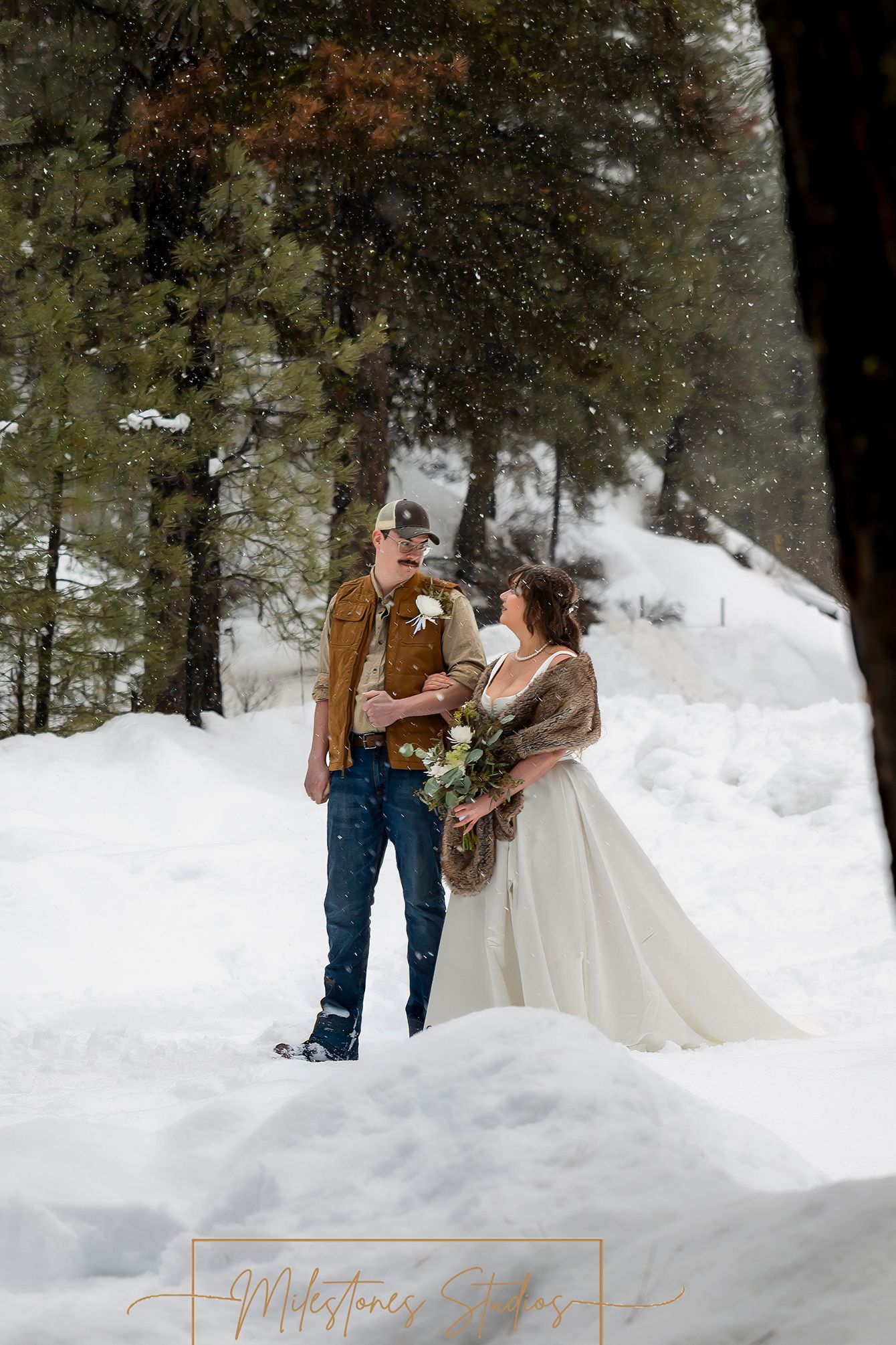bride and groom walking down the snowy aisle