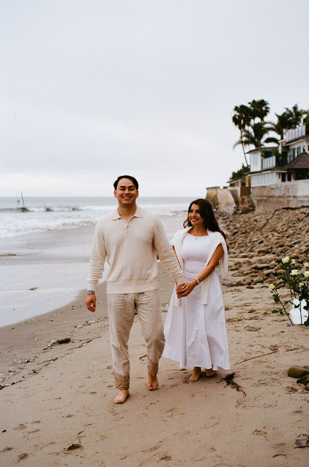 Intimate close-up of couple smiling after engagement.