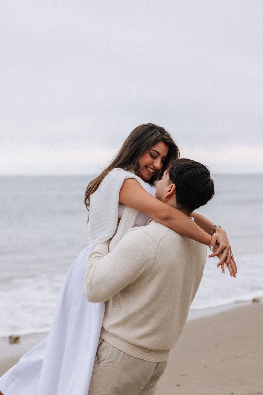 Hector and Stephanie laughing together moments after the proposal.