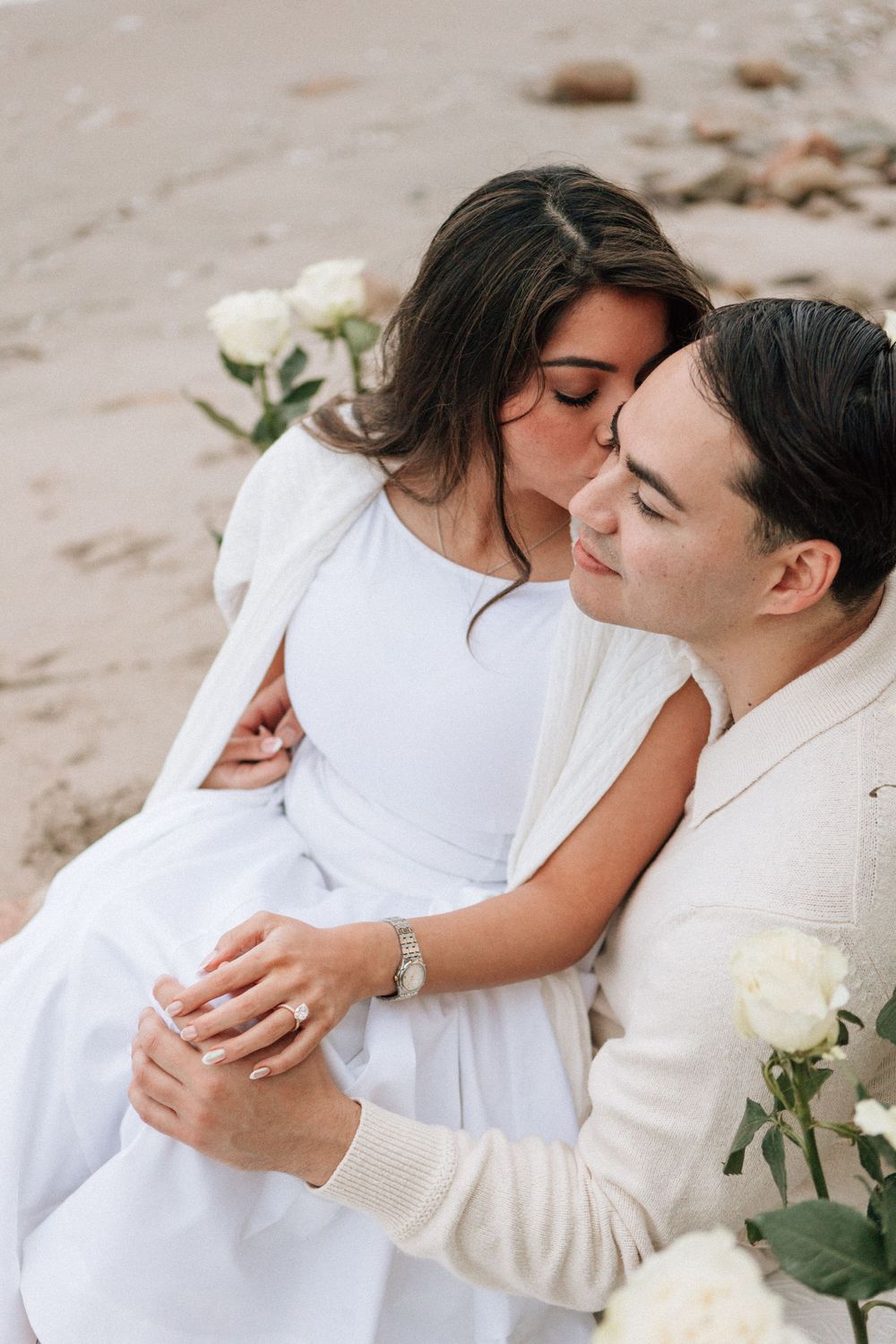 Proposal setup with cloudy skies and calm ocean at Miramar Beach.