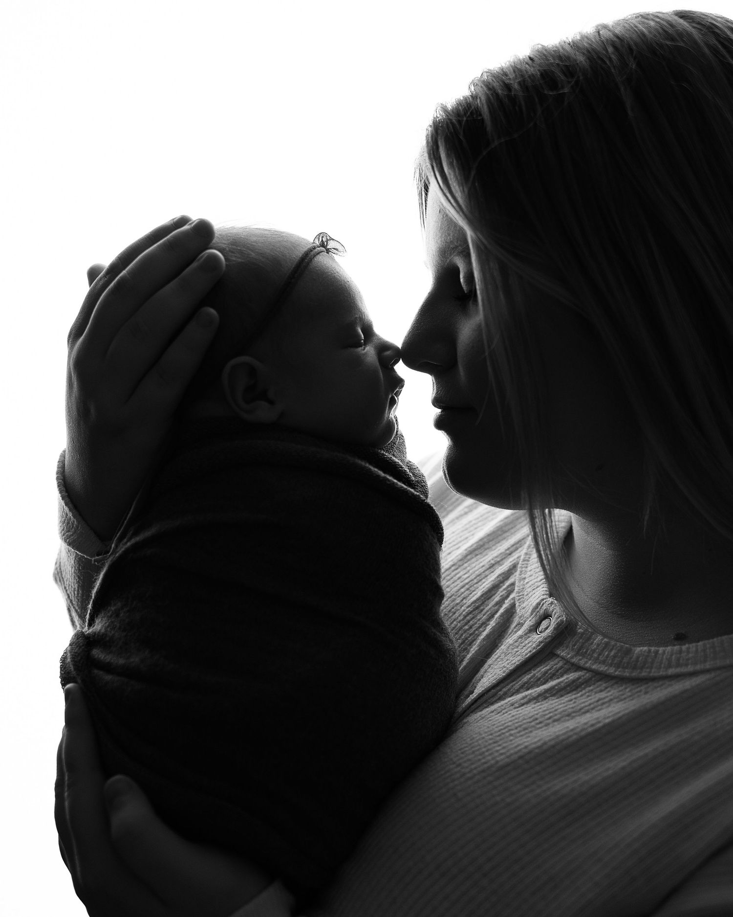Professional newborn baby photo with mom - black and white