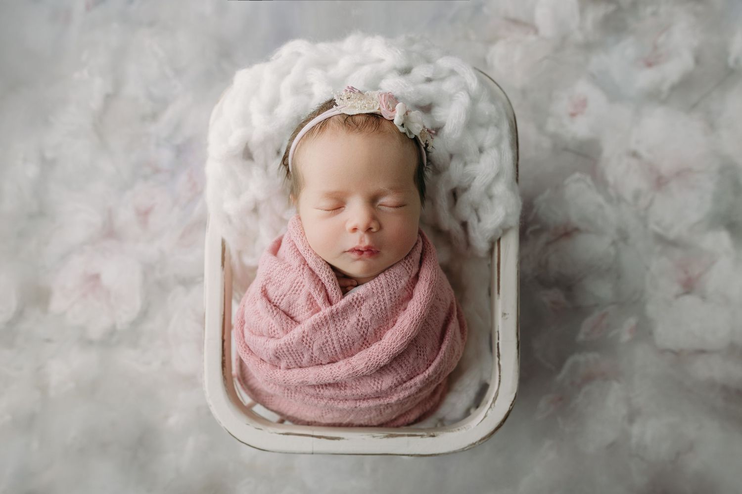 baby girl in twin newborn photoshoot in tampa