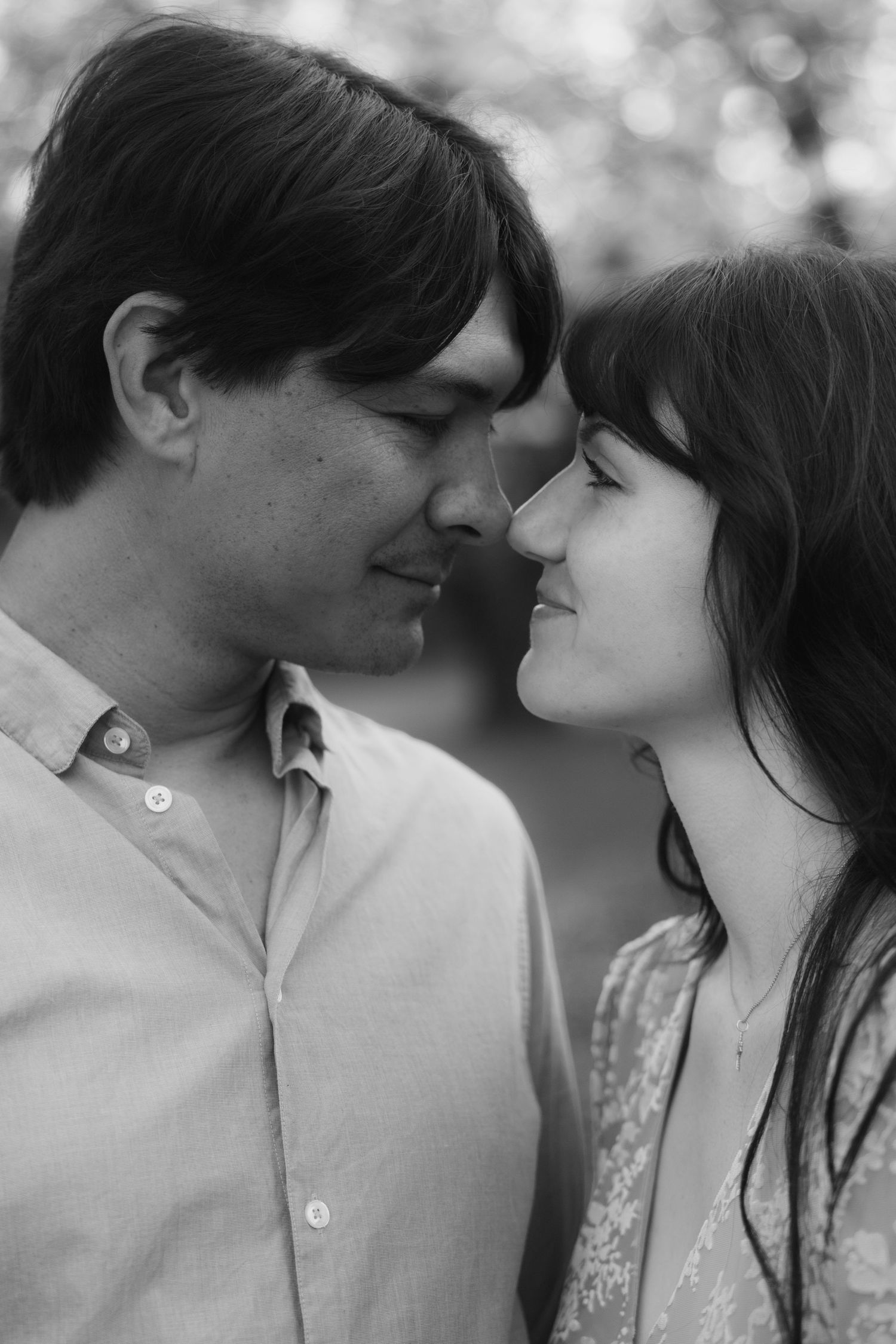 madison wi engagement couple photoshoot professional photographer spring uw arboretum cherry blossom trees lilacs middleton verona deforest