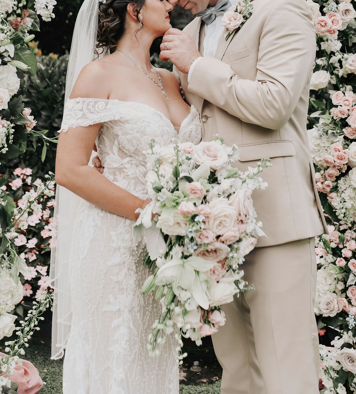 a close up photo of a bride and groom looking at each other during their formal wedding photos at the hotel drover
