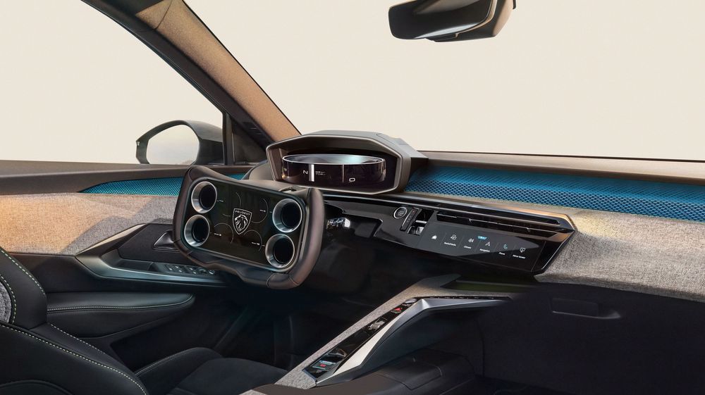 Modern car interior dashboard showing digital displays and sleek black design elements with ambient blue lighting.