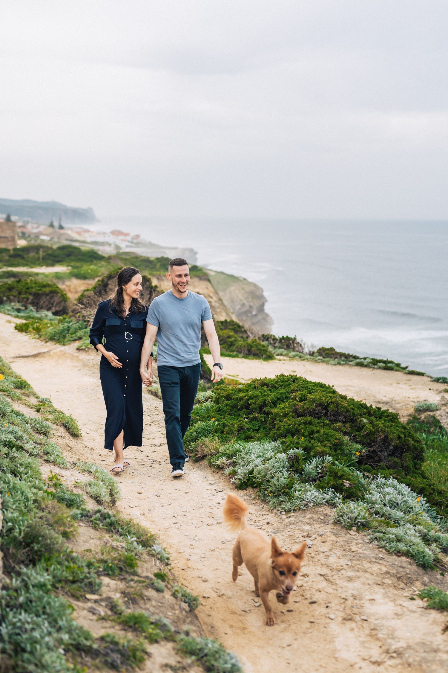 Natural and intimate pregnancy session at azenhas do Mar, portugal, capturing the beauty of a couple expecting their first child