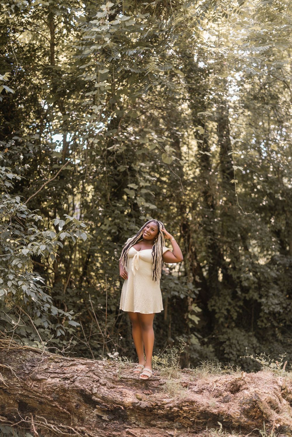 A sequence of nature photos shows a person in a white top enjoying a sunny day in a wooded area with dappled light.