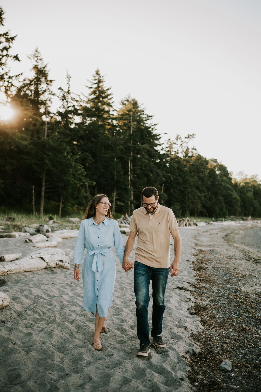 Comox Valley family photoshoot of parents walking couple photo on Kye Bay Beach Portraits taken by photographer Soulfull Photographs