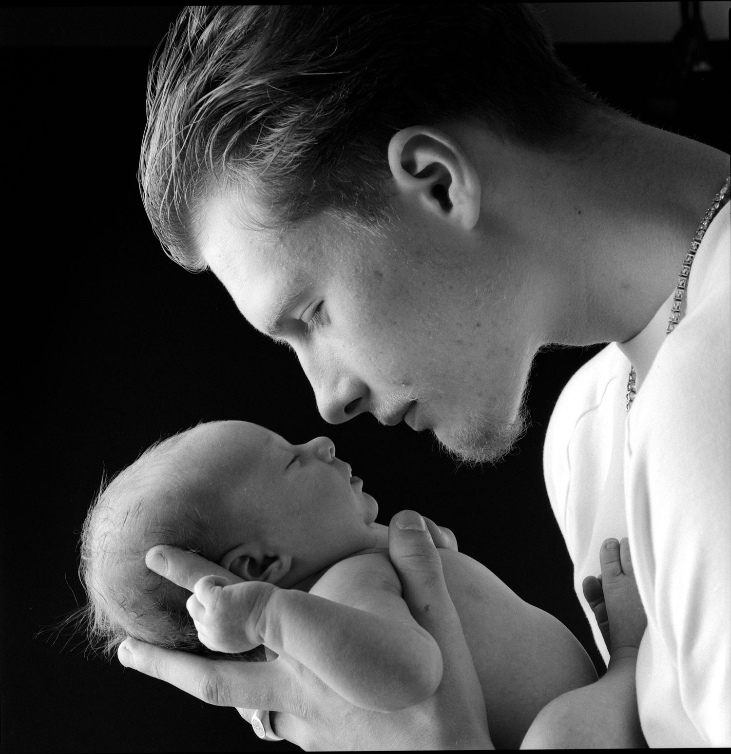 Father and baby girl black and white portrait