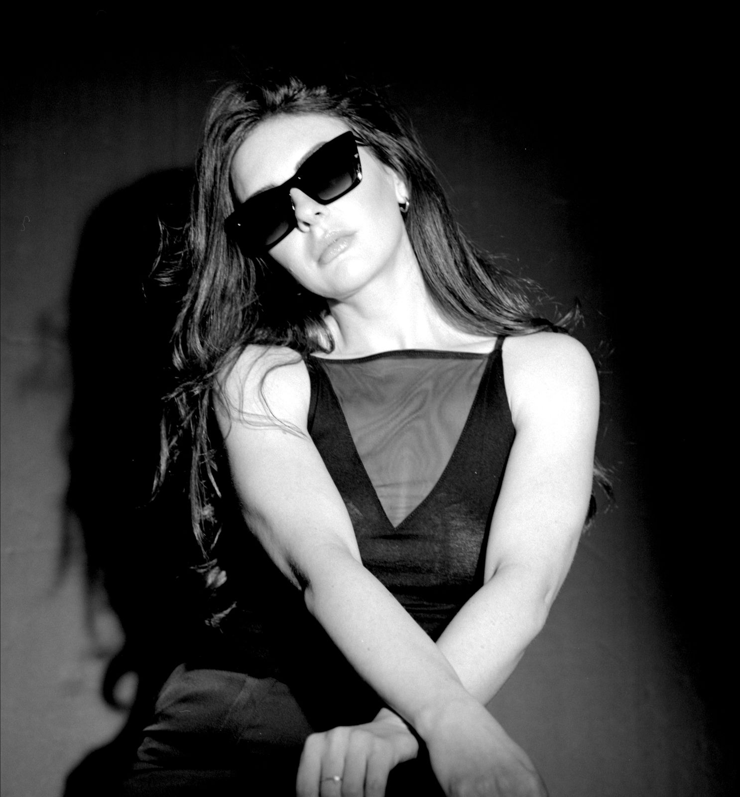 Creative black and white film noir style Portrait Photograph of UK model Alice Bryan