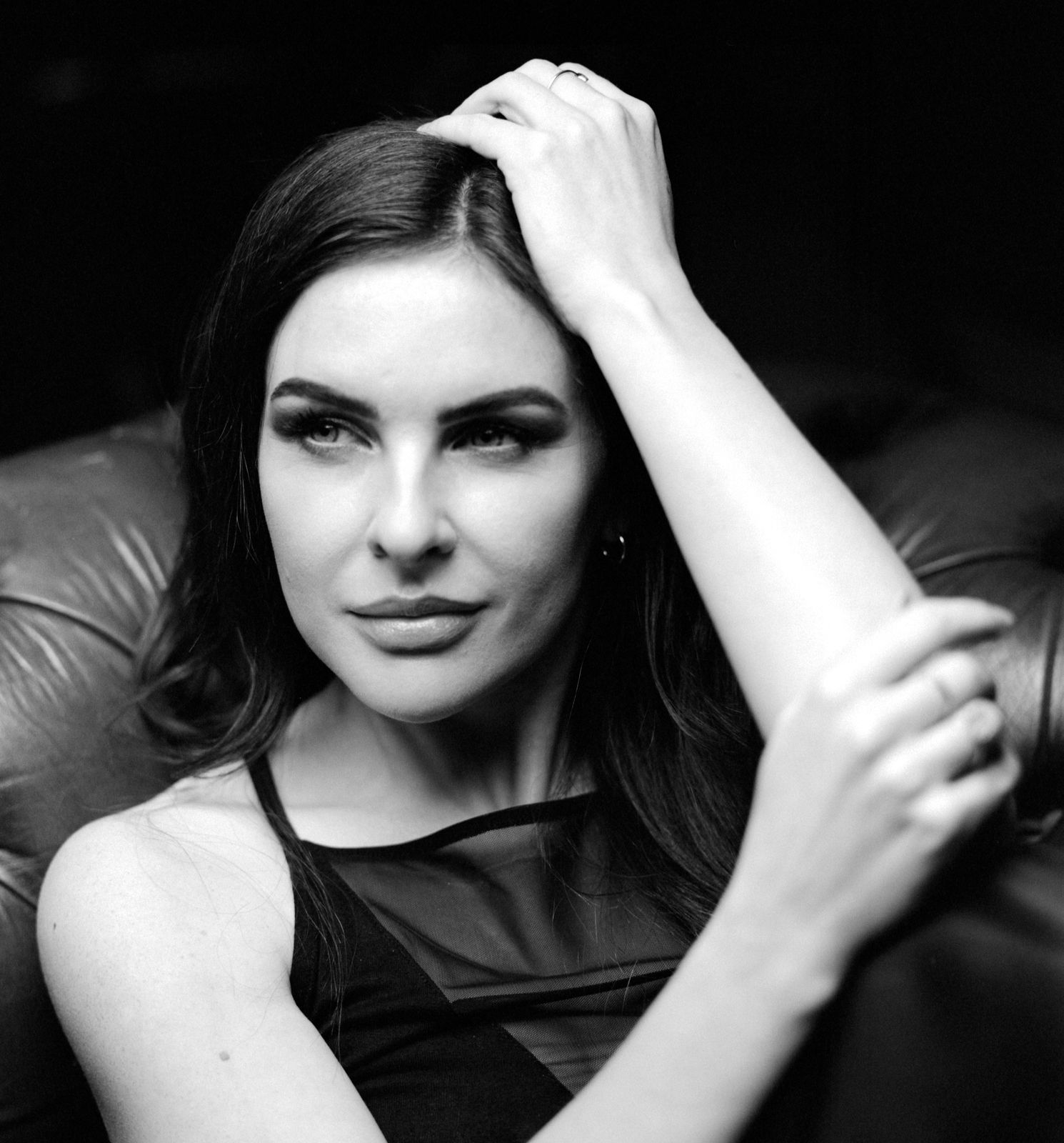 Creative black and white film noir style Portrait Photograph of UK model Alice Bryan