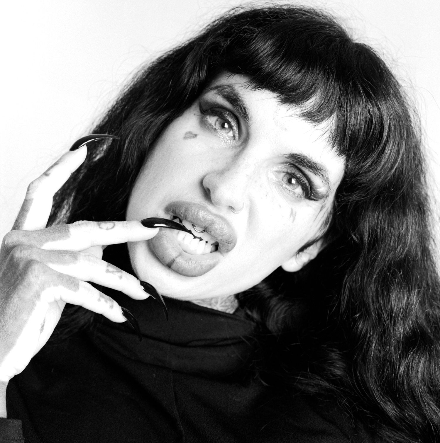 Model Tink Kaos photographed in black and white at The Boardroom Studio Derby