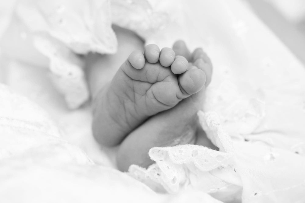 Føtter og tær til nyfødt baby på nyfødtfoto Flekkefjord