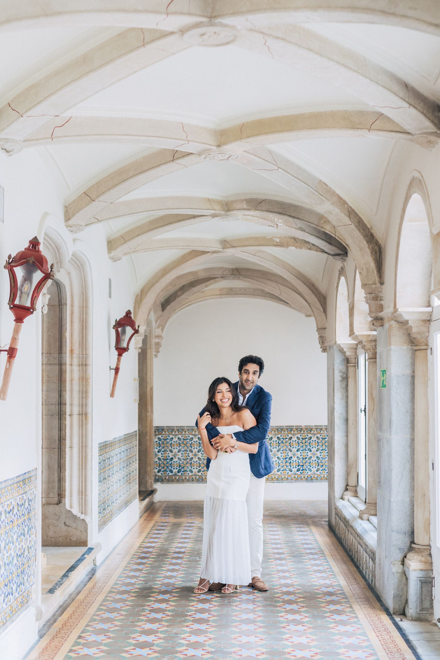 Romantic pre-wedding shoot in Sintra, Portugal, with an Indian couple exploring Penha Longa Resort. By a destination wedding Photographer