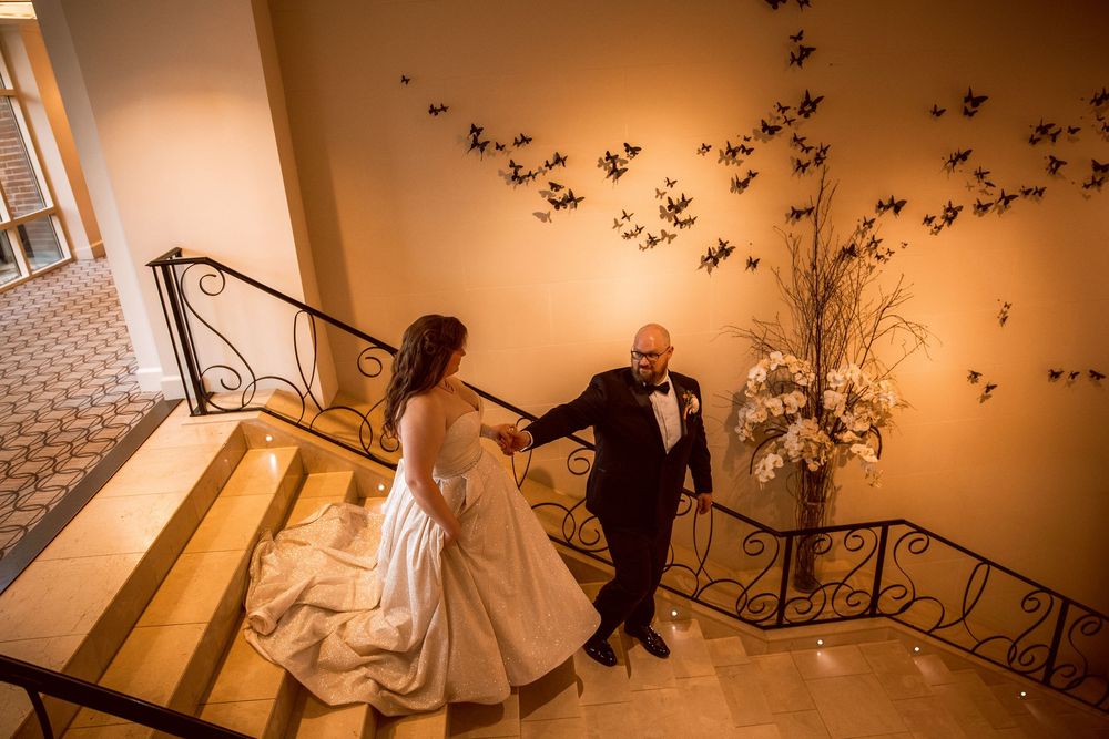 The H Hotel, Midtown, Michigan bride and groom on staircase.
