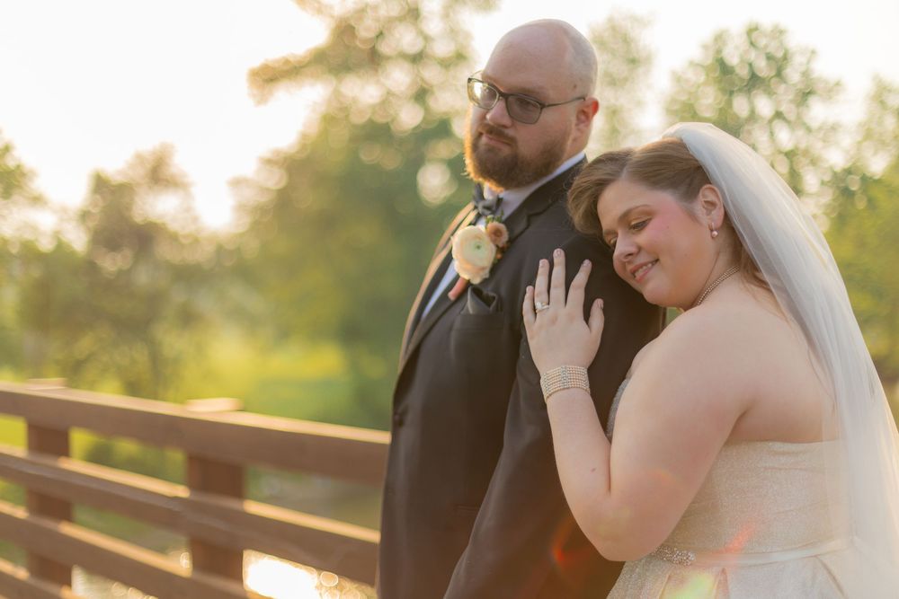 Bride and groom walking at sunset in Midtown Michigan