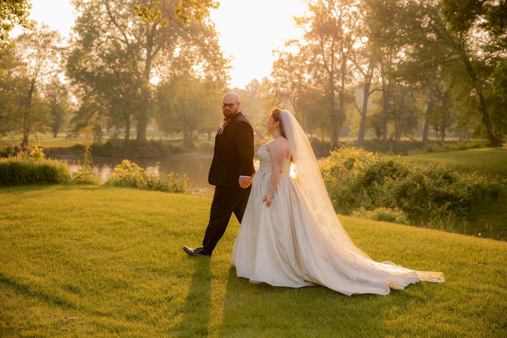 Fort Lauderdale wedding photographer traveling to Michigan, couple laughing during golden hour portraits