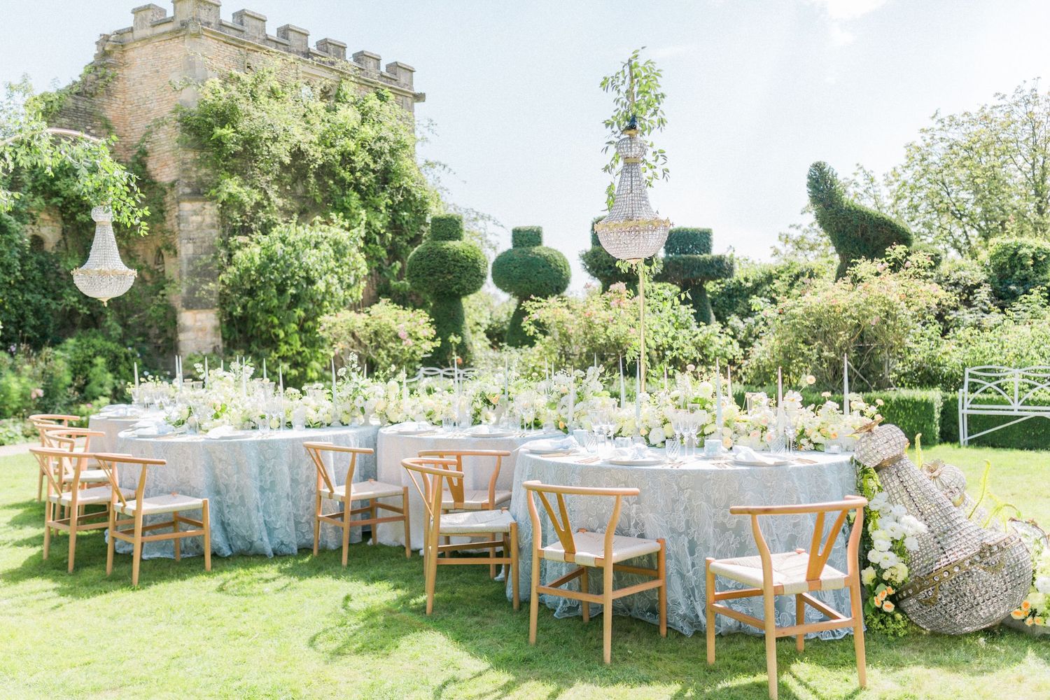 Elegant outdoor garden wedding reception at Euridge Manor, light blue linens and beautiful florals on a manicured lawn. Hayley Elizabeth