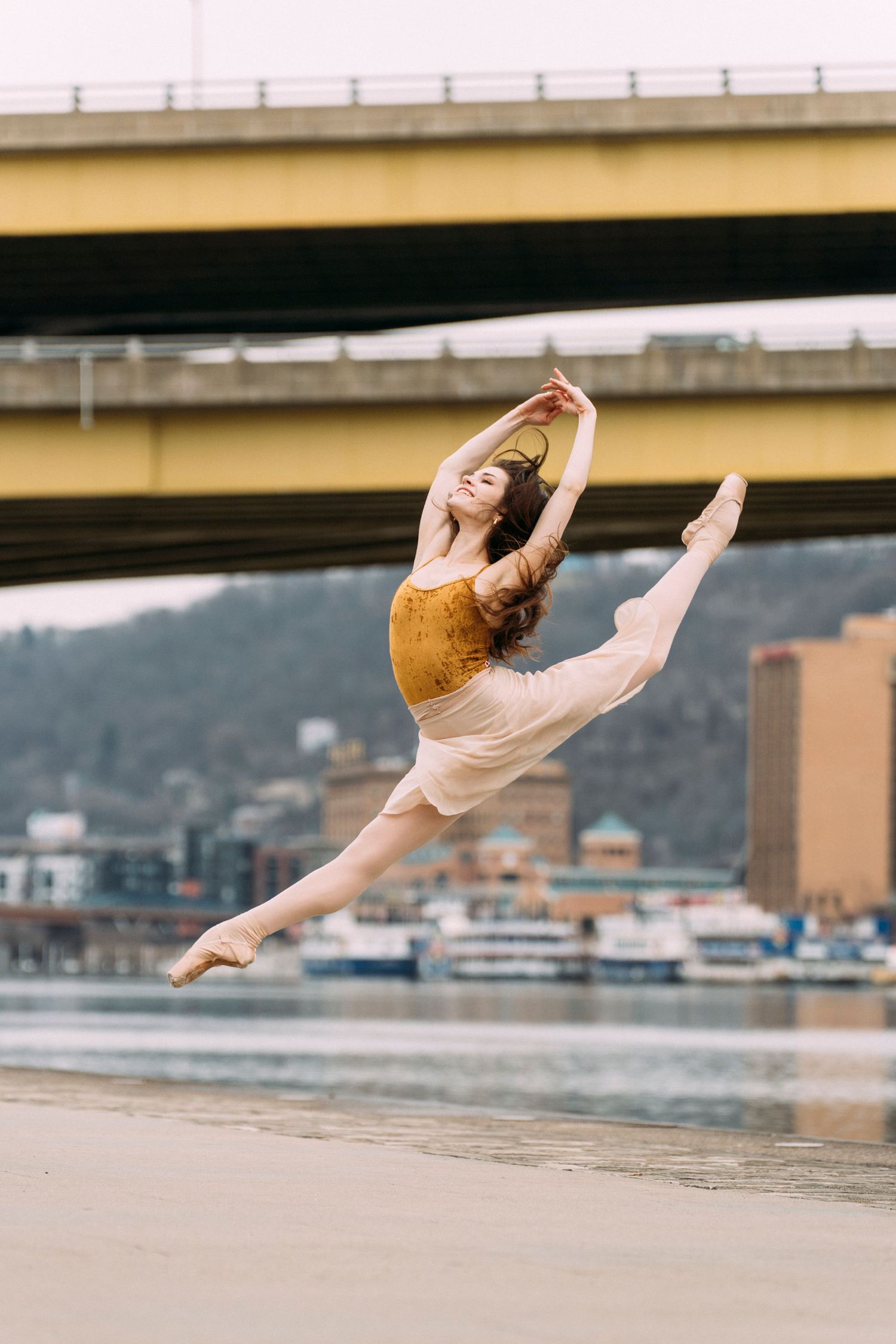 Pittsburgh ballerina captured mid-leap in elegant dance photography in Pittsburgh, PA