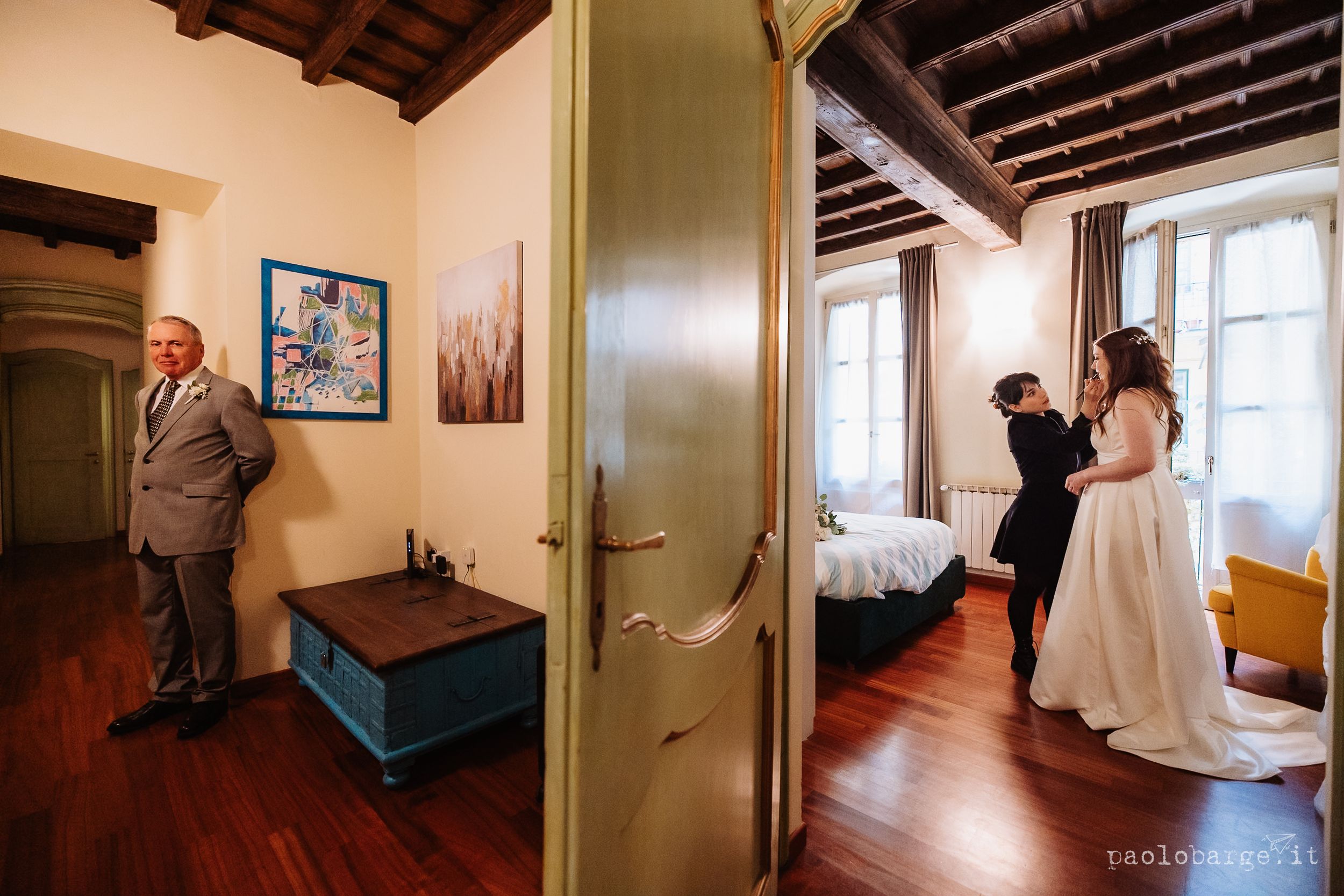 Split view wedding scene in rustic room shows people on opposite sides of a green door with hardwood floors.