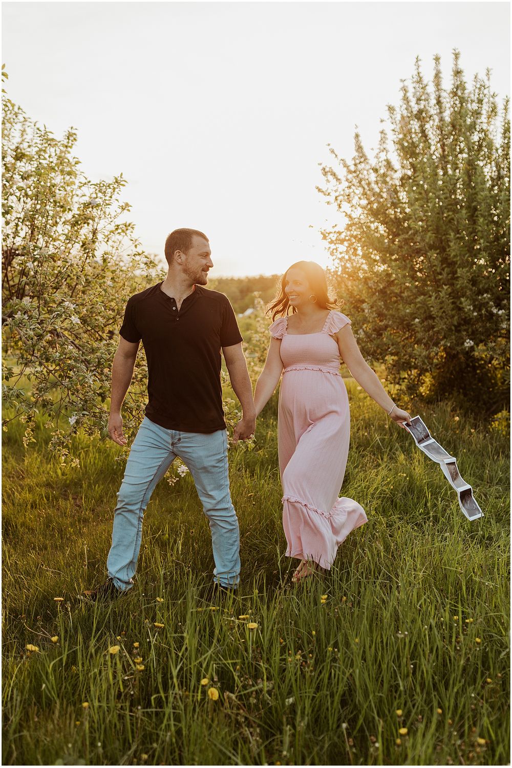 NH couple taking maternity photos