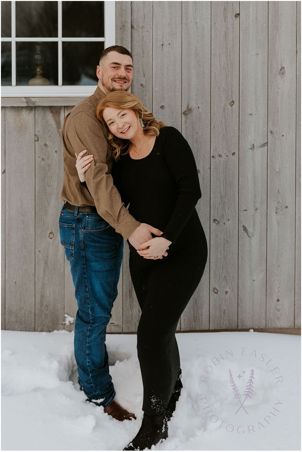 NH couple taking maternity photos in the winter