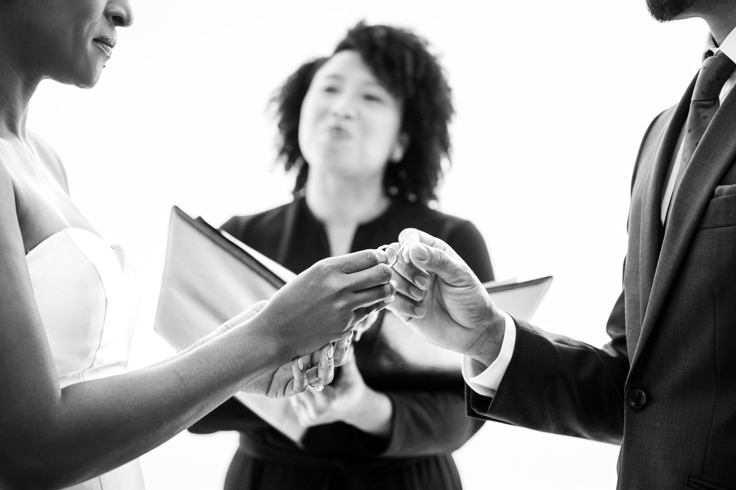 A series of black and white photographs showing professional workplace conversations and corporate interactions.