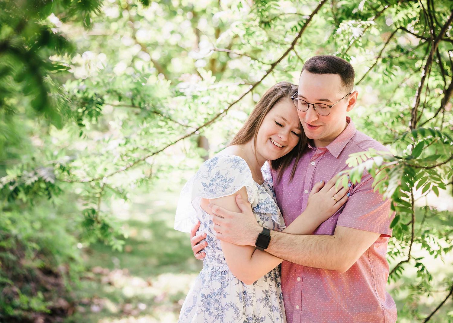 The Arnold Arboretum makes a dreamy background with this dappled light and numerous types of foliage for this Boston Engagement session.