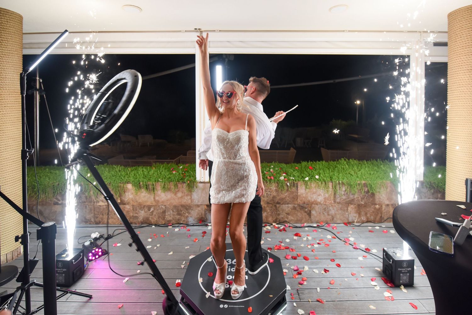 Ibiza bride and groom making a 360 video with cold spark machines at a wedding in ibiza at 7 Pines Ibiza