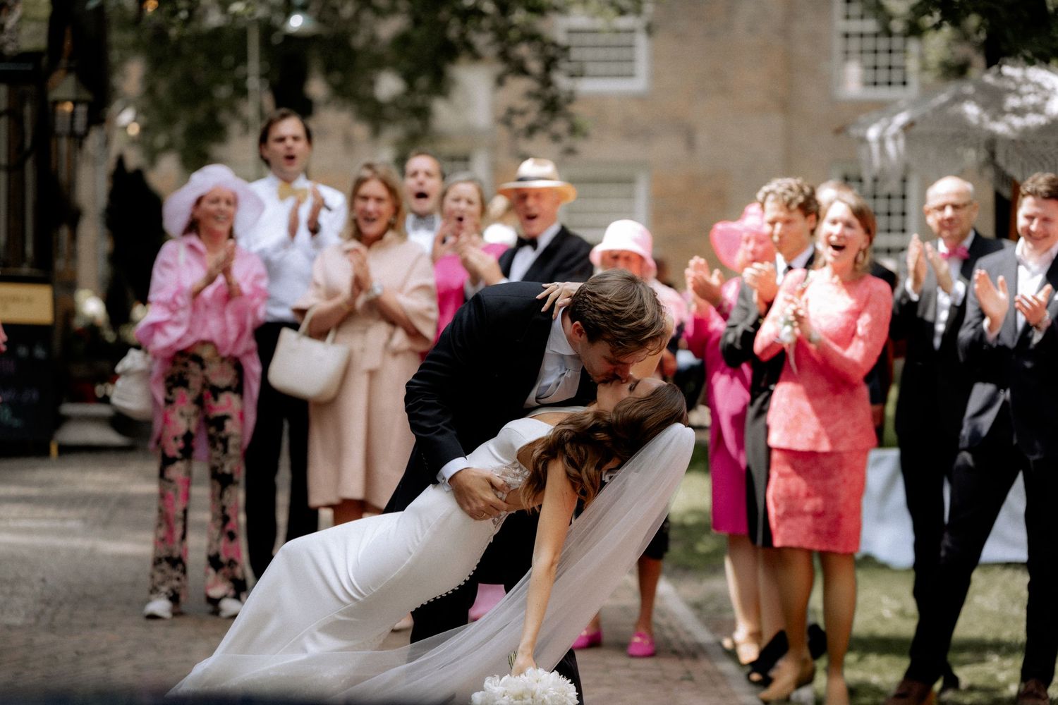 Groom kissing his bride on a emotional moment
