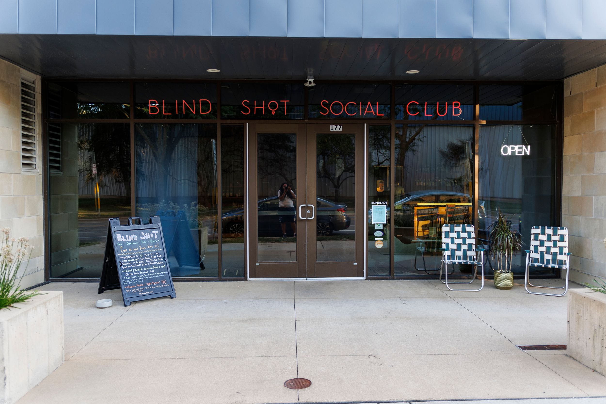 Exterior view of Blind Shot Social Club with signage and entrance visible.