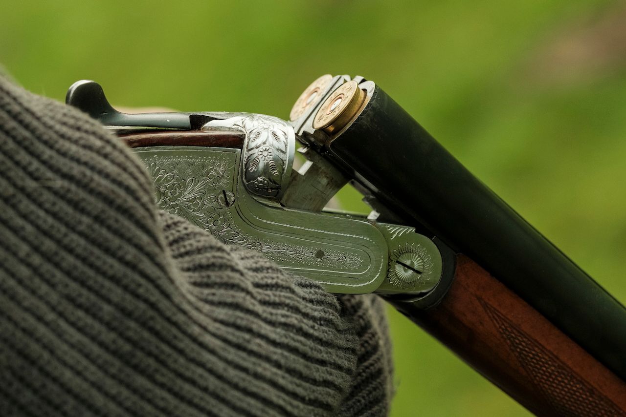 Reportage detail shot of shotgun from a driven shoot