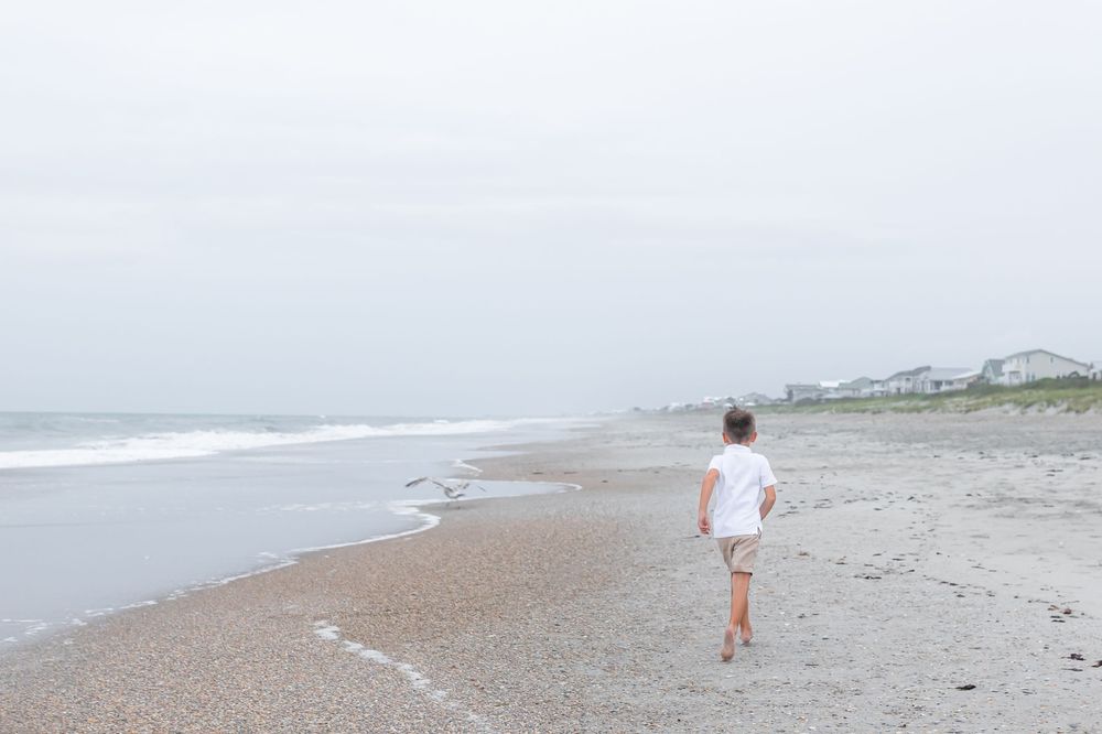 booking your Emerald Isle beach photographer Samantha Ann photo studio in swansboro nc senior beach photos