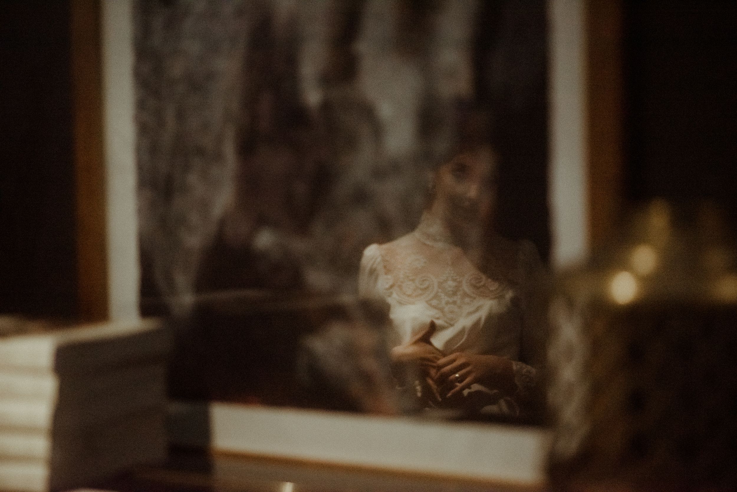 An artistic moody shot with smoke or fog in dim lighting.
