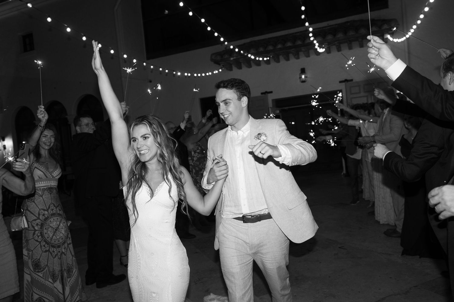 Bride & groom sparkler exit at wedding in Boca Raton, Florida at The Addison captured by Lindsay McDow Photography. Multi Media Adventures