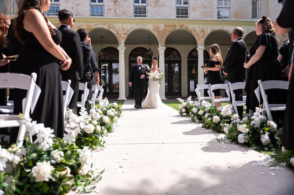 South Florida wedding photographers capture couple gazing at sunset