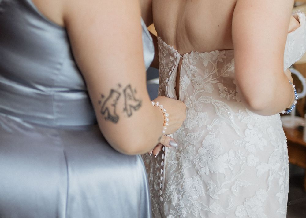 Bride and Maid of Honour getting ready wedding day photography Antigonish Nova Scotia Halifax wedding photographer beach wedding Maritimes