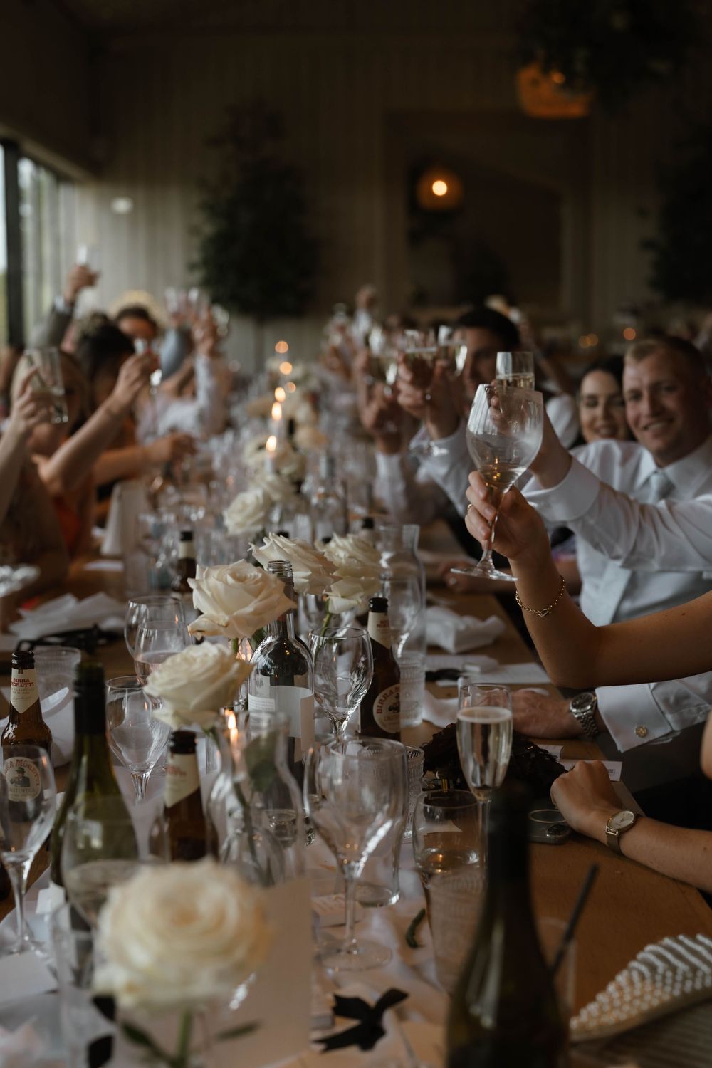 guests cheers glasses at Primrose Hill farm Wedding- Photo by Primrose Hill Farm Wedding Photographer, Olivia J Morgan Photography