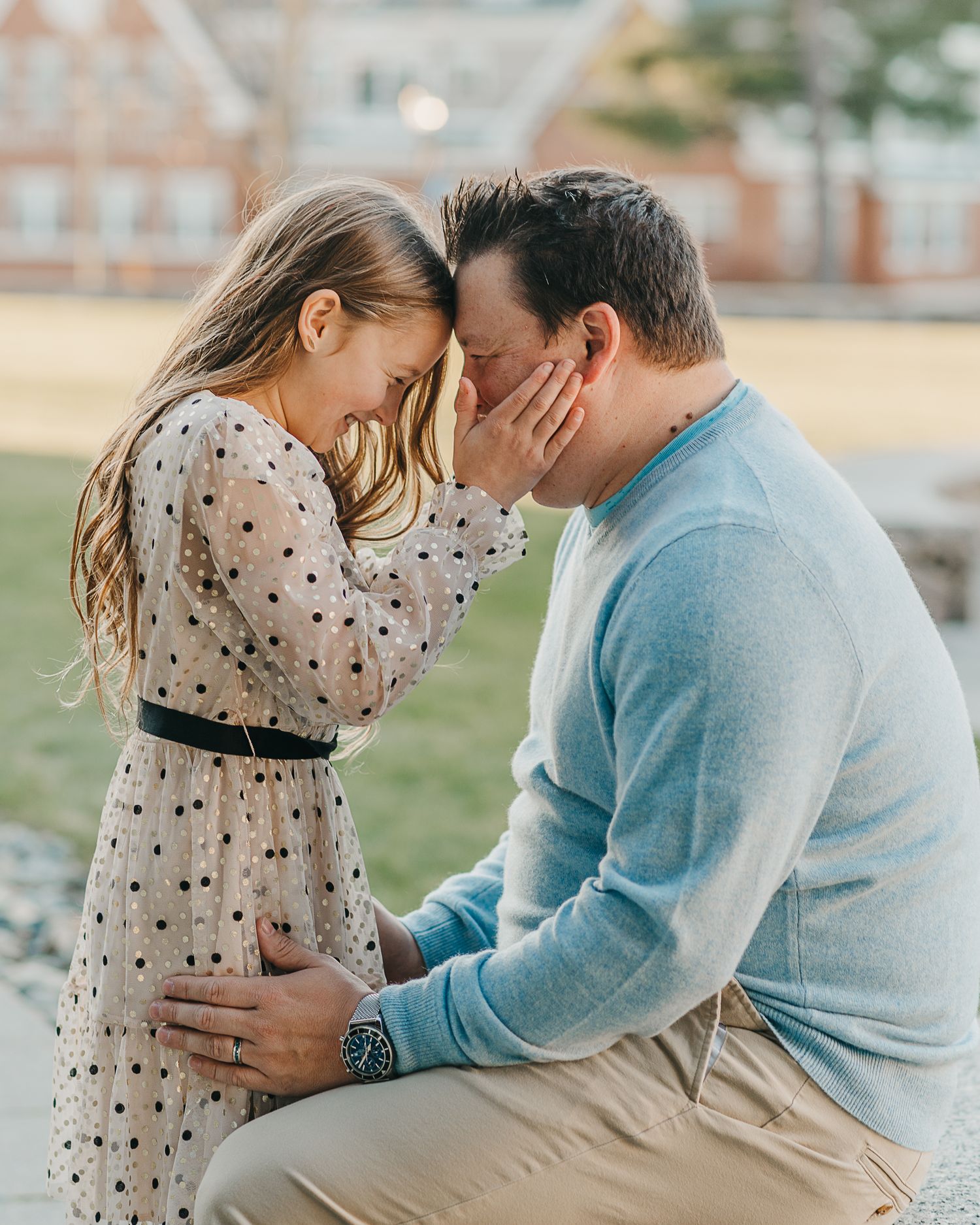 Sweet candid moment between two people in autumn setting.