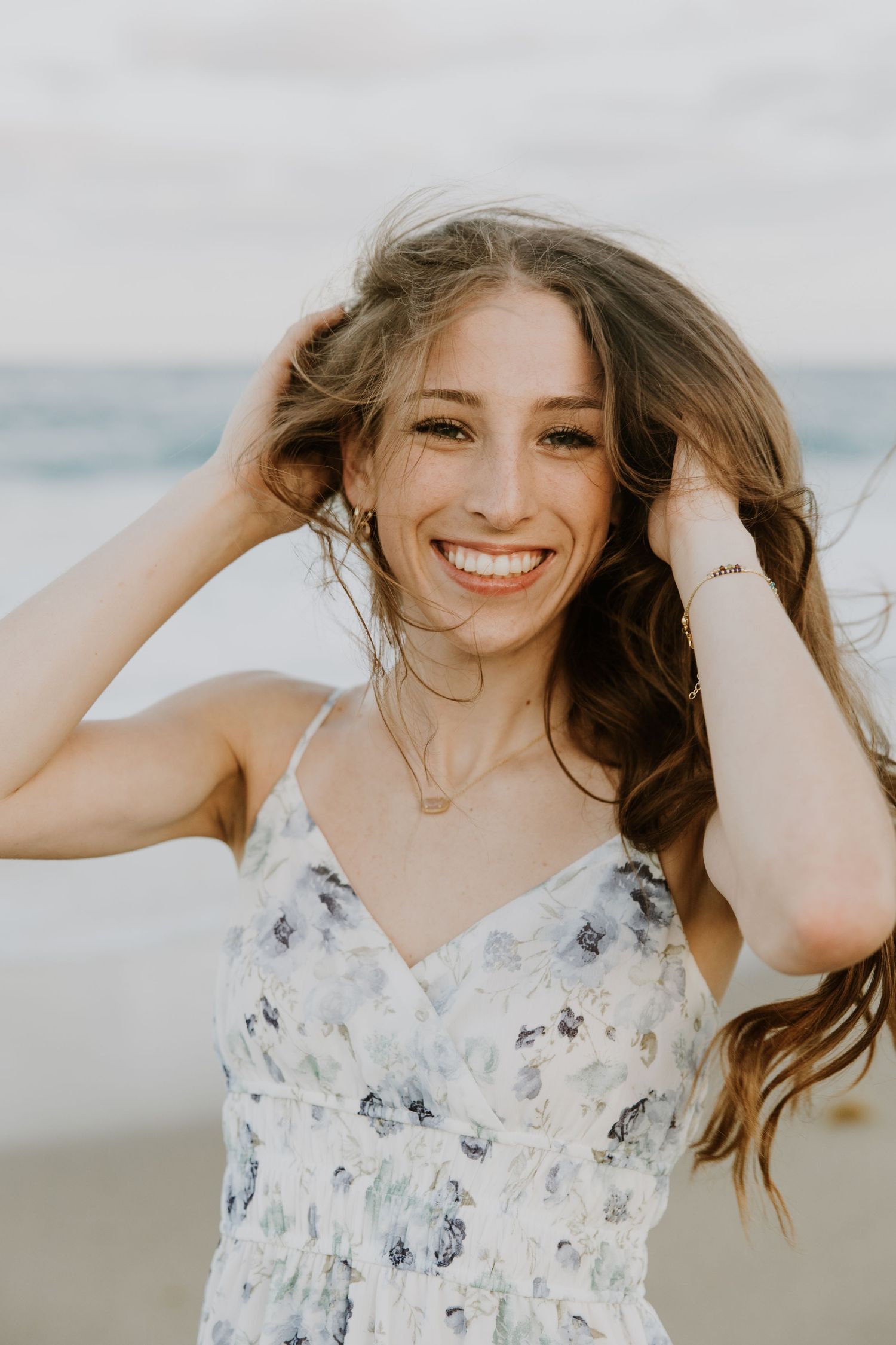 Golden hour graduation high school senior session photos on the beach Worth Avenue, Palm Beach Island captured by Lindsay McDow Photography
